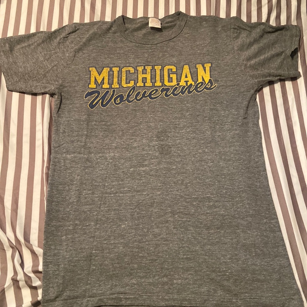 Student body Michigan T-shirt. Size medium. Little stain on it.